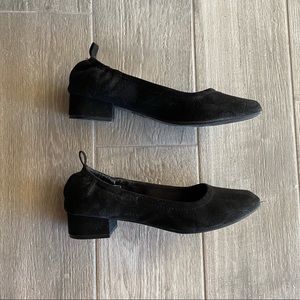 Black suede flat shoes